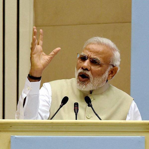 PM Modi attacks Congress on MGNREGA, hints at flexibility in land.