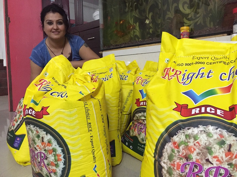 Actress Sona with the bags of rice she has collected in just a day