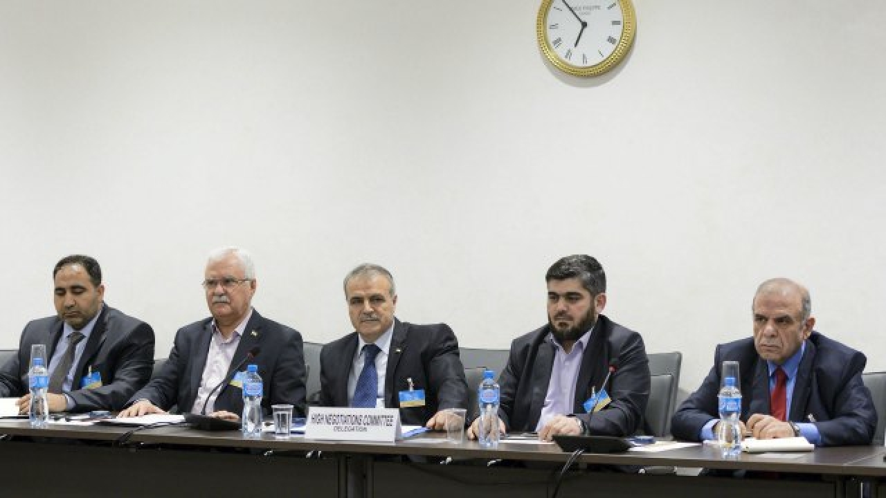 Members of the Syrian opposition delegation of the High Negotiations Committee (HNC) George Sabra (2nd L) delegation head Asaad 