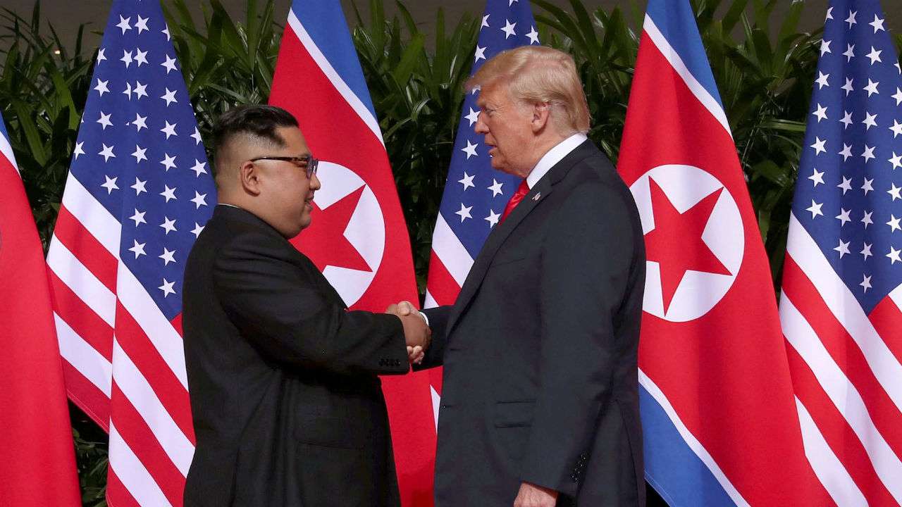 Us President Donald Trump North Koreas Kim Jong Un Launch Singapore Summit With Historic Handshake 3013