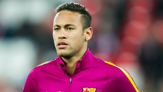 Neymar cleared of fraud, but faces corruption trial