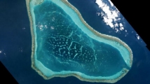 Boats at Scarborough Shoal in the South China Sea are shown in this handout photo provided by Planet Labs, and captured on March