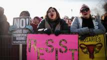 In Pics: One year after Donald Trump's inauguration, people take to th...