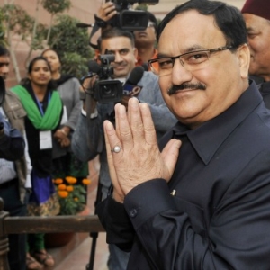 The Health Minister JP Nadda greeting the mass The Health Minister JP Nadda greeting the mass